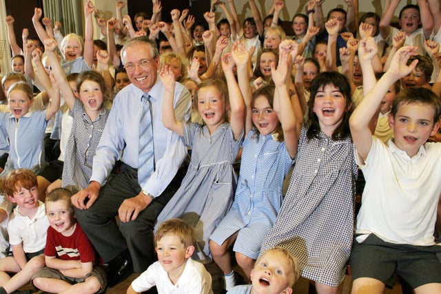 Pupils say goodbye to Turnditch primary school head teacher Michael Halls as he retires