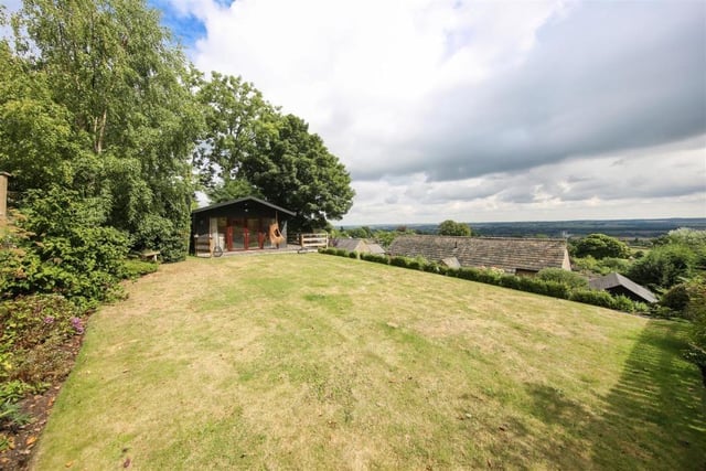 Take in the glorious views from the summerhouse which overlooks the lawn.