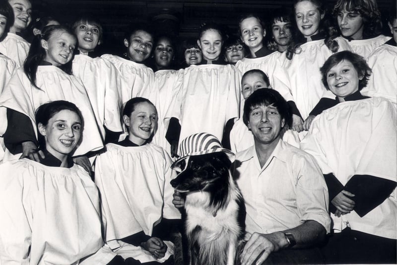 Blue Peter presenter John Noakes and Skip at the City Hall, with children at the Marti Caine Christmas pantomime November 18 1980