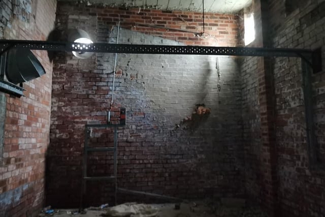 Another room showcasing the recognisable brickwork of Walton Works.