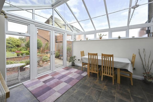 The conservatory is a lovely space, complete with a heat-reflective roof and double doors opening out on to the back garden. Karndean flooring and wall-mounted heater and air-conditioning unit add to the usefulness of the room.