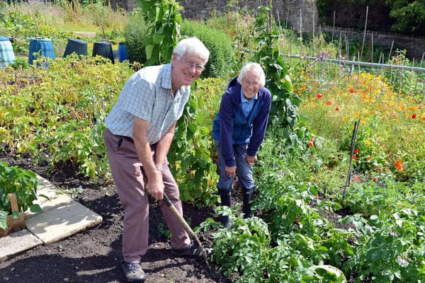 Mike and Judith Naden in the under-threat 100 year old allotments at Starkholmes, Matlock.