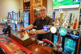 Manager Lee McMahon behind the bar at the Victoria Craft Union Free House, on Knifesmithgate, in Chesterfield