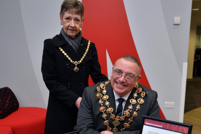 =Chesterfield Mayor Barry Bingham with Mayoress June Bingham sign the Book of Remembrance