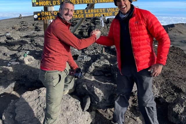 Alan Knight (left) with Jon Leonard at the summit of Mount Kilimanjaro