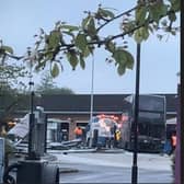 Picture shows what appears to be a seriously damaged bus amid disruption at Crystal Peaks bus station