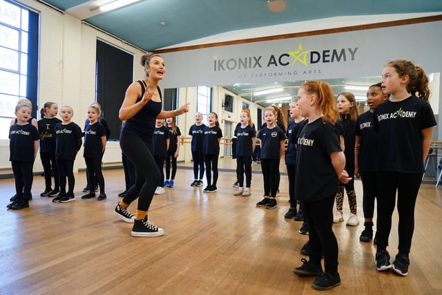 Ami Evans, head of musical theatre at Ikonix Academy of Performing Arts, guides her students through a rehearsal for Dreamcoat Stars.
