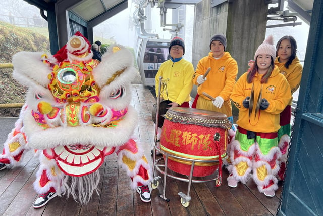 The Sheffield Chinese Lion Dance Team greeting guests at the Heights of Abraham to celebrate the start of the Lunar New Year and the beginning of the cable car season.