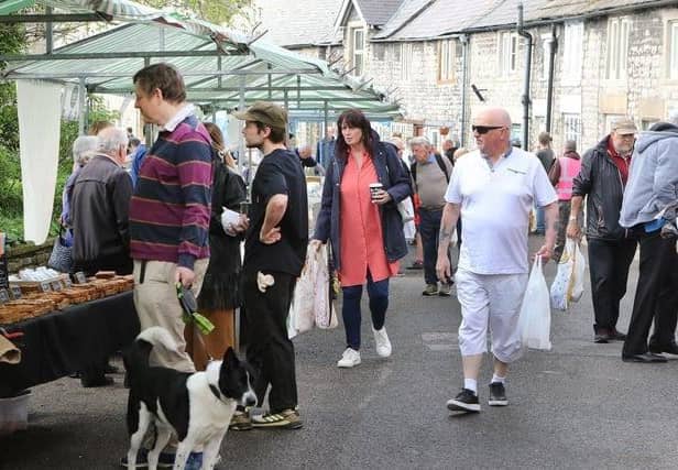 Food stalls draw the crowds to Tideswell for the annual festival.