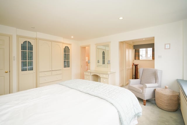 This elegant room has fitted wardrobes, a dressing room and an ensuite.