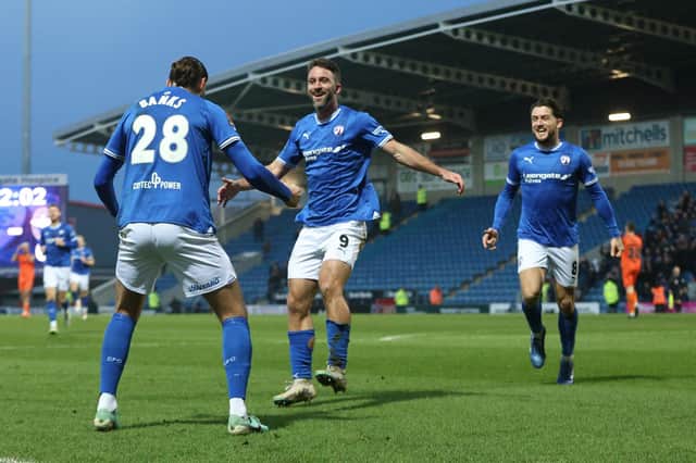 Chesterfield lengthened their lead at the top of the National League to 11 points thanks to a second-half brace from Ollie Banks and a 12th goal of the season from top marksman, Will Grigg.