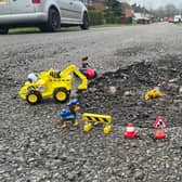 Coun Shipman has decorated potholes around Wingerworth and Tupton.