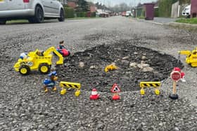 Coun Shipman has decorated potholes around Wingerworth and Tupton.