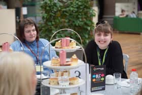 Supported Intern, Shelbie Webb celebrating her success at an Afternoon Tea held at the Buxton campus