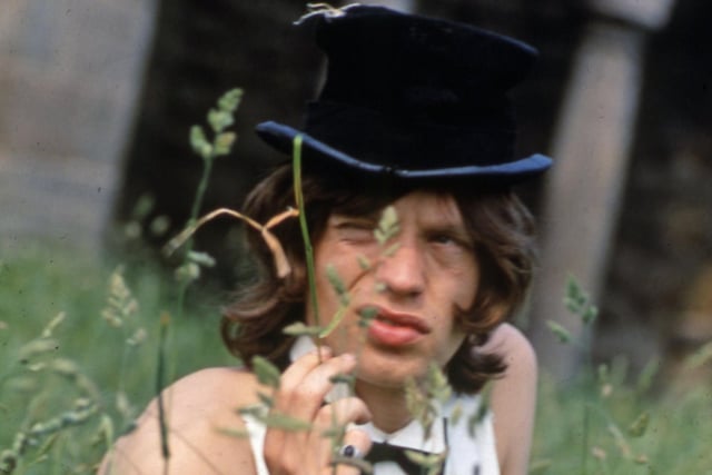 Mick Jagger of the Rolling Stones, portrait at Swarkestone Pavlion, Derbyshire, 1968. Swarkestone locals were bemused and excited to discover the Rolling Stones in the local pub. The band had been driven up from London in limos to shoot the cover of their seventh album, Beggars Banquet. (Photo by Mark and Colleen Hayward/Getty Images)