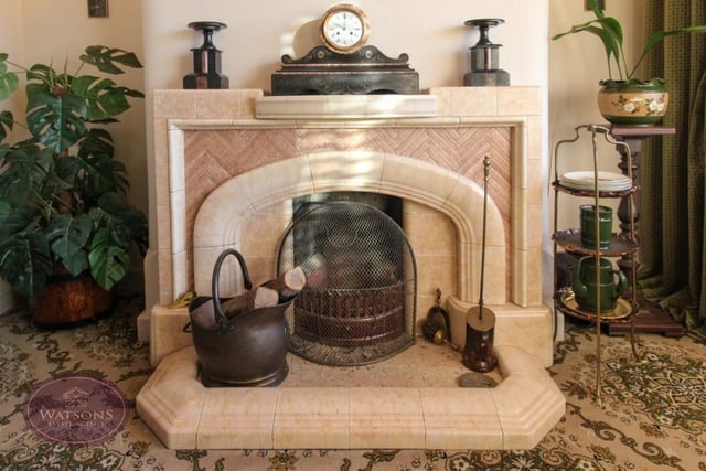 Here is a close-up of the lovely feature fireplace in the dining room.