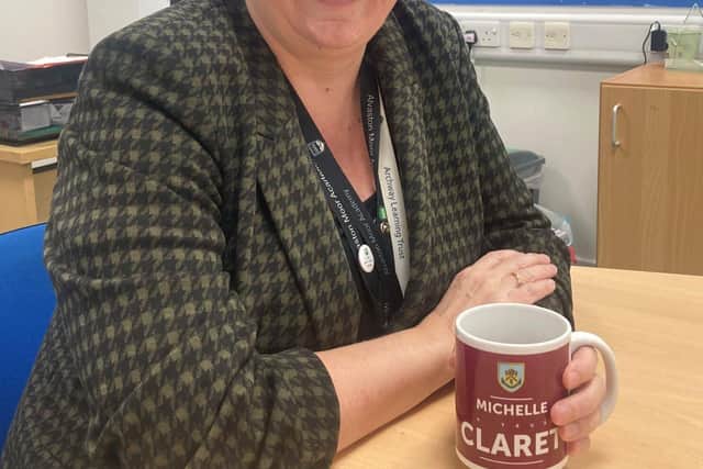 Michelle Strong with her Burnley FC mug