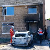 Fire investigators at the scene of the devastating house fire on at Kelly Rutter’s home on Beech Crescent in Killamarsh, which police are treating as arson.
