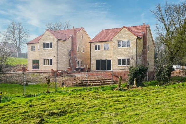 This five bedroom detached property is currently unfinished, but is expected to be completed in June 2022. It's got a price tag of £700,000.
