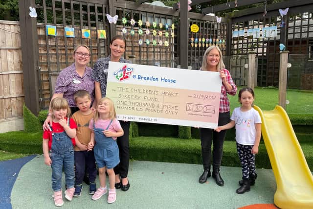 L-r: Alice, Luke and Giorgia, Natalie Fearn, early years teacher, Nicola Taylor, nursery manager, with fundraiser Jodie Cassidy and her daughter.