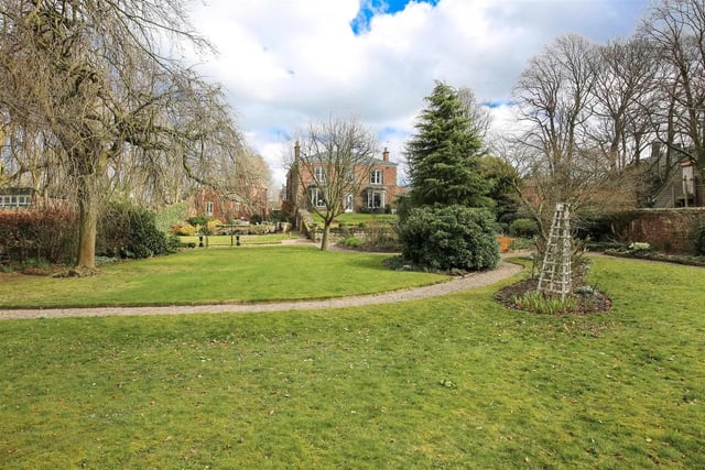 Lovingly restored by the current owners, this imposing, double bay-fronted mid Victorian home occupies grounds measuring approximately 2 acres with landscaped Victorian walled gardens and far reaching views across Kenning Park, Smithy Brook and beyond.