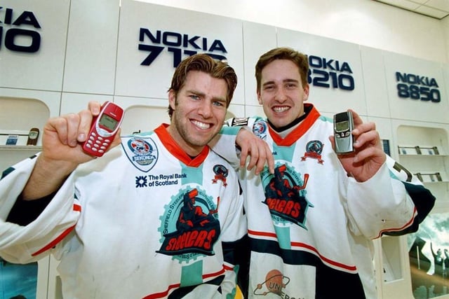 Sheffield Steelers stars Kent Simpson (left)and Shayne McCosh at the official opening of the new Nokia store in 2001