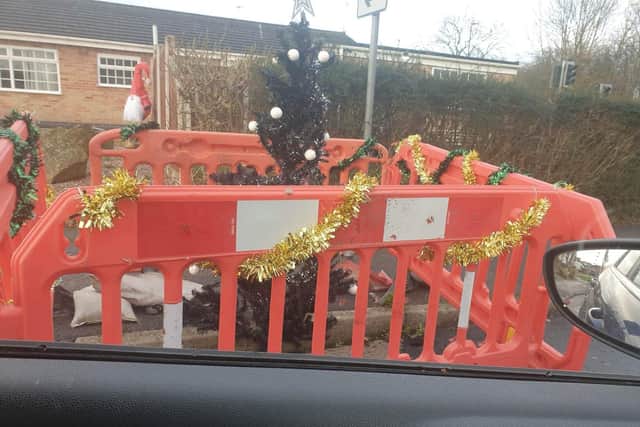 One resident opted to decorate the barriers - which had been left on the route for months.