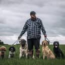 Will Atherton, Canine Behaviourist, pictured with the dogs he trains.
