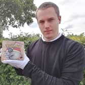 David Wilson-Turner with Pokemon Fossil Set First Edition which is estimated to raise £11,000 at auction.