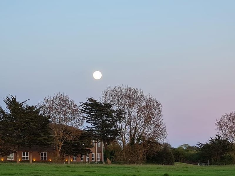 Portsmouth Super Pink Moon: Jack Holden captured it shining over the Langstone Hotel