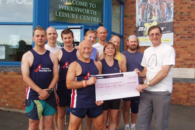 Mike Briggs and members of Wirksworth Running Club presented a £250 cheque to Chris Broom of the Chernobyl Child-line Bonsall Link charity in 2007.