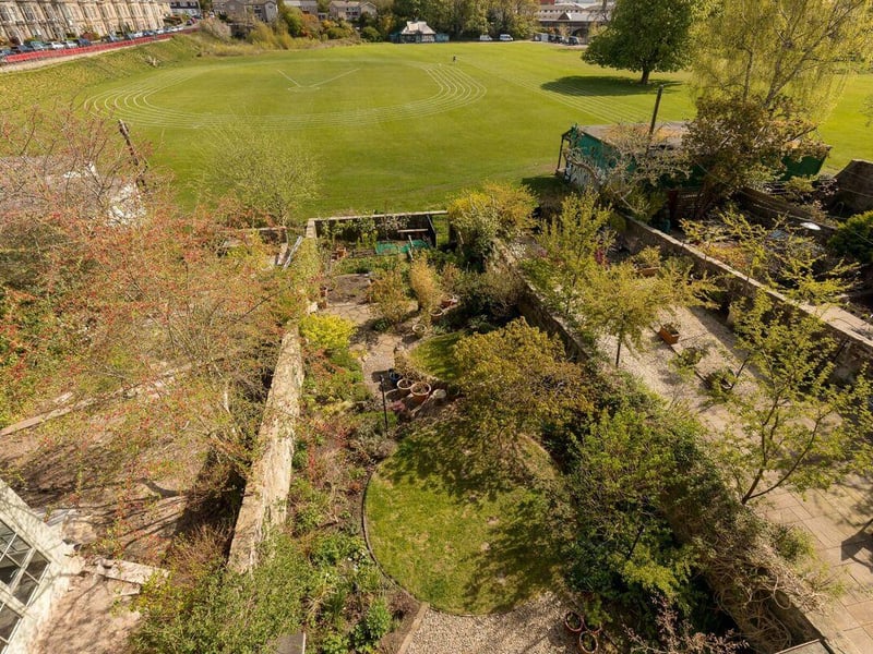 View over rear garden and playing fields.