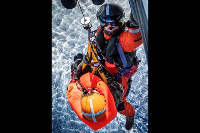 845 Naval Air Squadron conduct a search and rescue of an isolated pilot, who has become stranded at sea, as part of a training exercise in how to recover personnel onto HMS Queen Elizabeth. This image was part of the winning selection by Photographer of the Year Leading Photographer Kyle Heller.