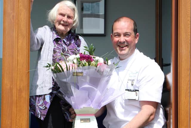 Podiatrist Simon Boulton with 100-year-old Dorothy Ash at the new North Derbyshire Foot Clinic on Smedley Street. (Photos: Roy Goodall)