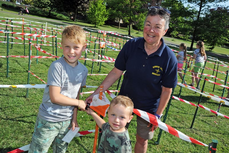 George Lancaster, 8, and his 3 year old brother, Harry pictured with Val Johnson at the start of the maze on Whitworth Park, where the Derwent Valley Orienteers staged an open event to raise the profile of the sport.