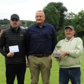 Longcliffe trophy winners James Dennis, left, and Harold Allsobrook with director Chris Wainwright, centre.