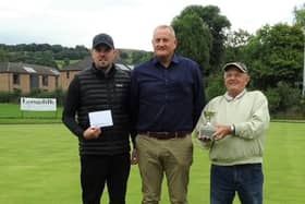 Longcliffe trophy winners James Dennis, left, and Harold Allsobrook with director Chris Wainwright, centre.