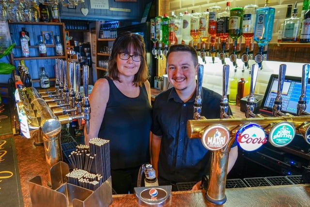 Bar staff Keiran Lucas and Cathy Ratcliffe.