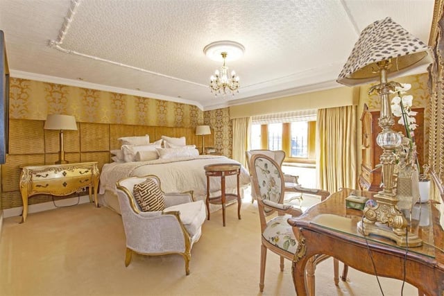 This beautiful room with its golden decor is the perfect place for a restful, good night's sleep.