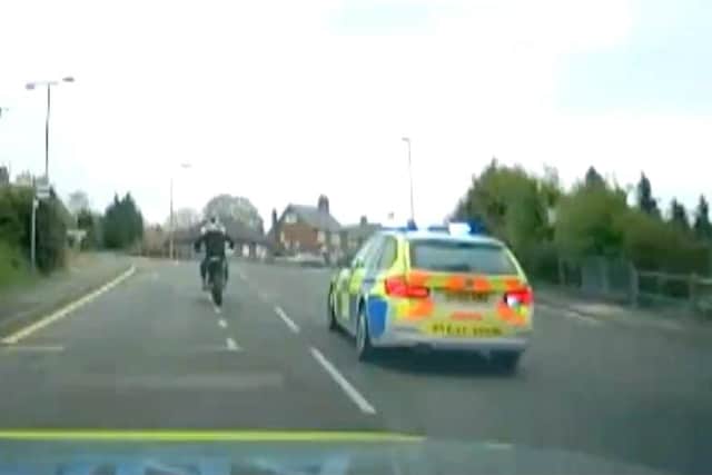 The footage shows him travelling on the wrong side of the road, going through red traffic lights, and riding up pavements.