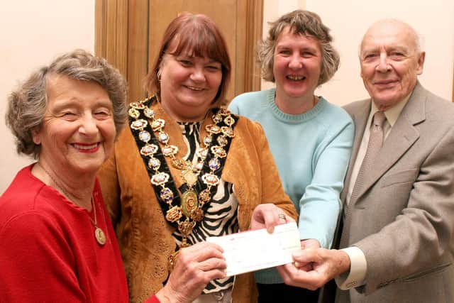 Jack Westlake of NEDSCAN, Jackie Pennington representing DAB and  the Mayor of Chesterfield Chris Ludlow receive a cheque for their  charities from Margaret Bradshaw.