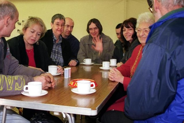To mark the national homeless day a special Sunday Cafe for the homeless was held at St Peters Church in Chains in 2000. Rosie Winterton photographed speaking with visitors.