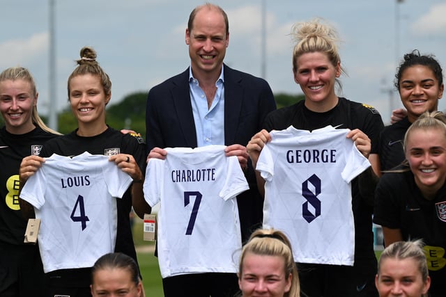 Prince William, Duke of Cambridge poses with England players including Bright after receiving a gift of three England shirts, each bearing the name of one of his children, whilst visiting the England Women's football team at St. George's Park last month.