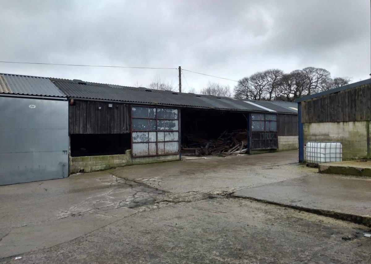 Disused Peak District farm buildings demolished, as horse grazing land, arena and stables are approved 