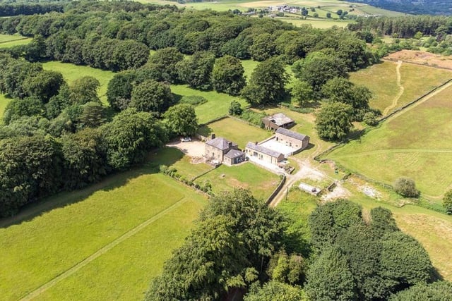 Drone footage shows Moor Grange surrounded by green fields.