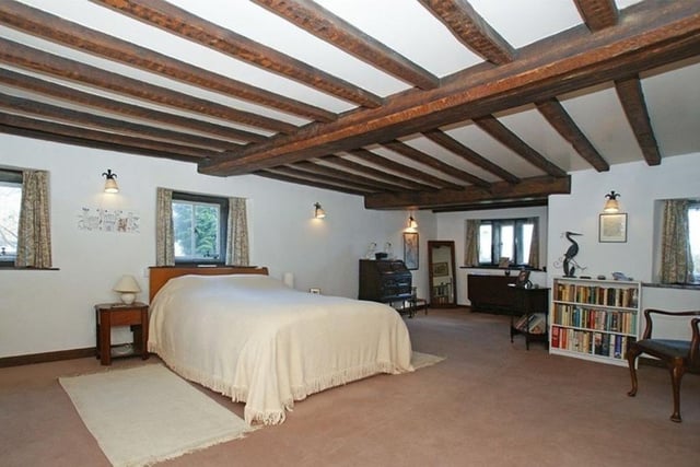 All four bedrooms are spacious and two have original ceiling beams.