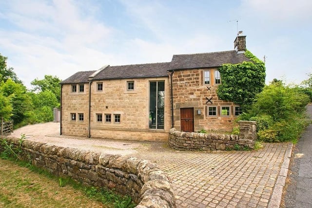 A contemporary extension has expanded the accommodation in the early period cottage.