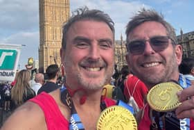 The couple are pictured here after completing the London Marathon.