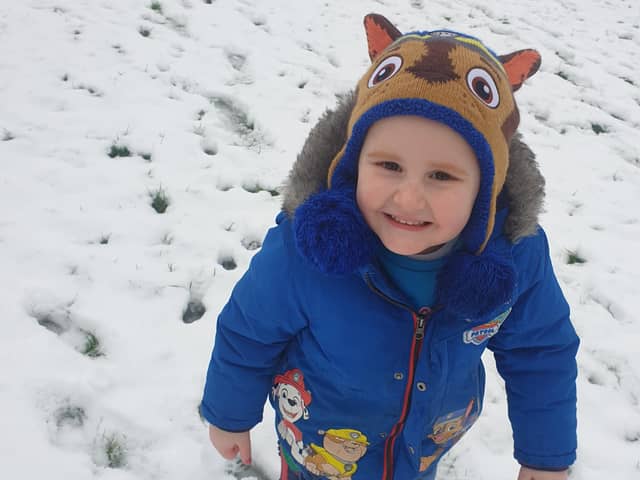 Brave little Eli Newsome has a rare brain illness and his family is raising funds so he can attend a medical trial in Amsterdam.