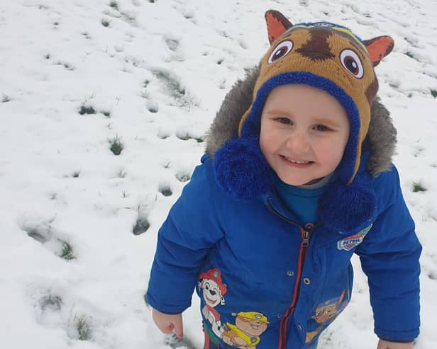 Brave little Eli Newsome has a rare brain illness and his family is raising funds so he can attend a medical trial in Amsterdam.